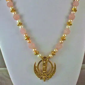 Carved rose quartz pearl adi shakti necklace