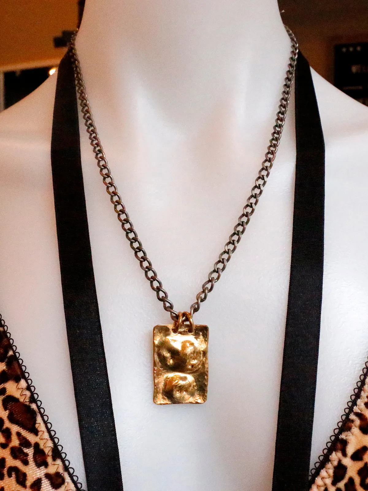 Dennis Higgins Emerging Skulls Pendant Necklace