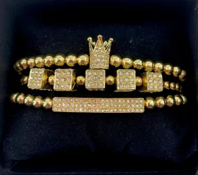 Gold king’s crown and dice charms bracelet set